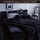 Assembly and installation included. Black semi-double bed with storage. Black bed with storage, shelf, outlet, craftsman mattress and hotel-style cover included. Semi-double.