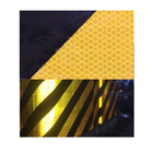 a close up of a yellow and black tie