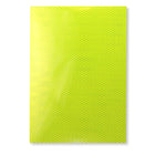 a close up of a yellow wall with a book