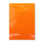 a close up of a orange on a bench